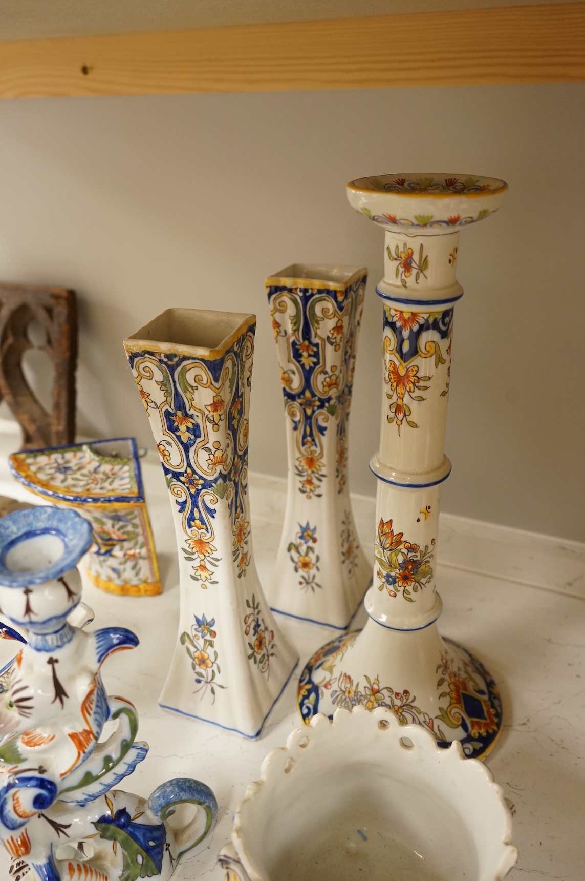 A collection of early 20th century French faience pieces, tallest 37cm